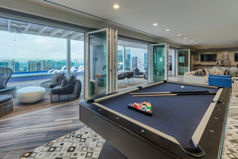 Club room with gaming area and outdoor seating
